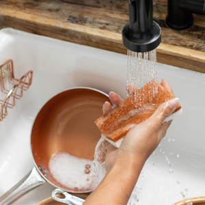 Hand washing pan with Cloud Paper's Coconut Kitchen Sponge