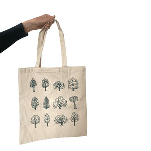 Recycled cotton tote bag with tree illustrations printed on the side